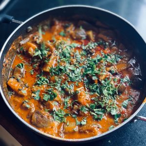 cooked food in black cooking pot